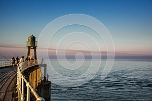 Whitby Pier seascape in Yorkshire England UK