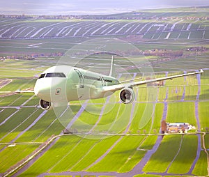 White 3D aircraft flying above landscape