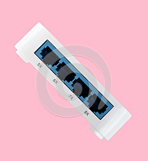 White 8 Port Plastic Ethernet Switch isolated on pink background