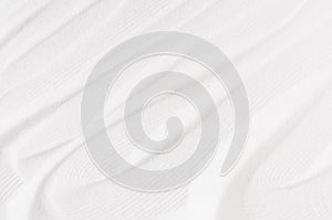 White abstract grainy with smooth wave background.