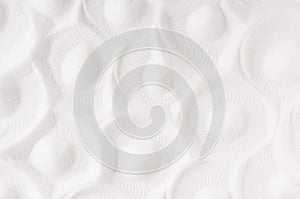 White abstract grainy soft background with rippled circles pattern.