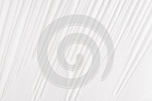 White abstract rippled smooth background with vertical lines.