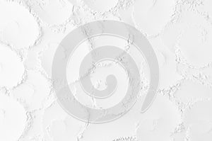 White abstract soft smooth plaster background with curl spiral rose pattern.
