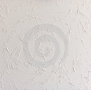 White abstract structured background wall with rough stucco patt photo