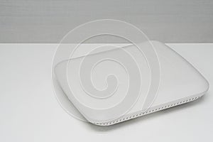 white access point on desk