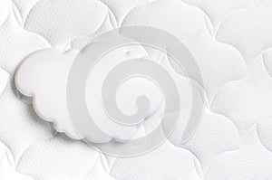 White air cloud on a comfortable mattress texture background top view. White texture of mattress bedding background. Healthy sleep