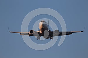 White aircraft on the blue sky background
