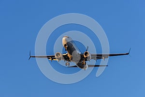 Airplane flying under the sky.