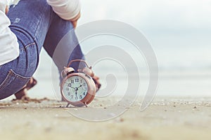 White Alarm Clock on Natural Beach