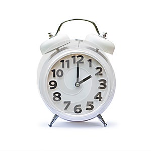 White alarm clock at two 2 o`clock isolated on white background clipping path