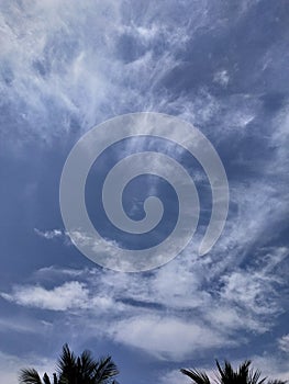 Strange alien shape cloud visible in the sunny daylight