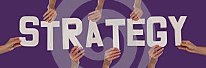 White alphabet lettering spelling STRATEGY