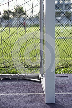 A white aluminum goal with a white net for kidâ€™s football.