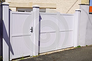 White aluminum home gate portal of residential suburbs house