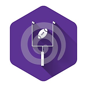 White American football with goal post icon isolated with long shadow. Purple hexagon button