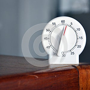 White analog egg timer