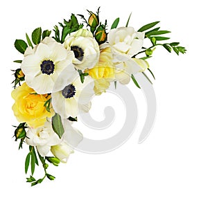 White anemones, yellow roses, eucalyptus leaves and freesia flow