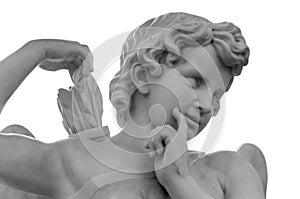 White angel against white isolated background as a symbol love. Ancient Eros statue. Sculpture of young man with quiver