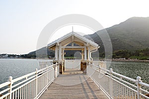 A white arbor on the lakes