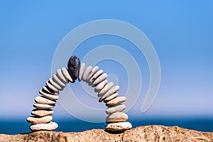 White arch of pebbles