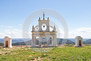 White arch of Steeple and sentry boxes in the interpretation center of the peÃÂ±a de arias montano in Alajar, Huelva,Spain photo