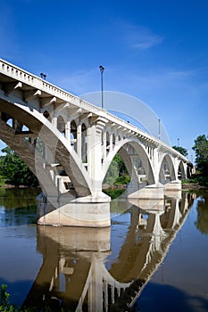 A white arched bridge over the Wabash River in Vincennes, Indiana. photo