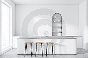 White arched kitchen with white bar