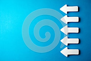 White arrows on a blue background