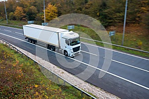 White articulated lorry on the road