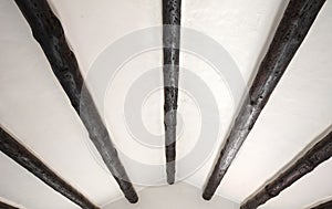 White attic with large wooden roof beams