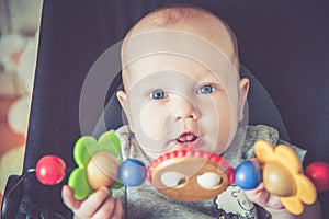 White baby portrait, looking to camera