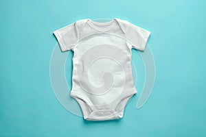 White baby romper mockup on blue background.