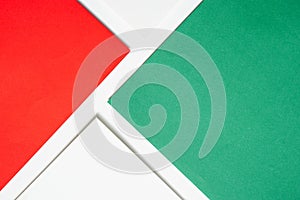 On a white background, an abstract background notion of white and green and red blank paper alignment