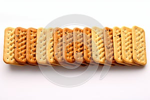 White background accentuates the precision of a row of crackers