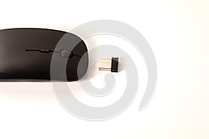 On a white background, a black computer mouse without a wire