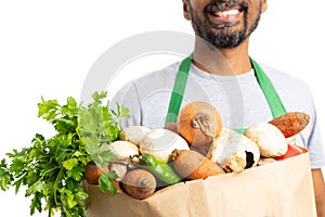 Close-up of grocery bag held by store employee