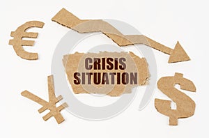 On a white background, currency symbols, an arrow and a cardboard box with the inscription - CRISIS SITUATION