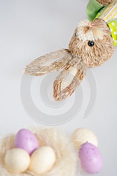 White background with Easter eggs and rabbit