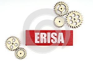 On a white background, gears and jenga with the inscription - ERISA