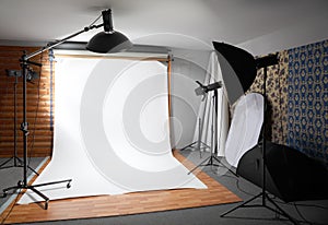 White background inside studio - lighted lamps