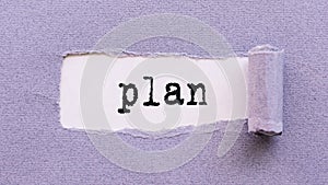 White background with PLAN text under violet torn paper. Goals, success, strategy, solution and business concepts