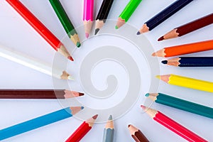 White background for presentation, copy space in colourful pencils circle