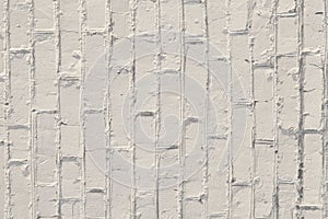 White background. The texture of a brick wall painted with white paint.