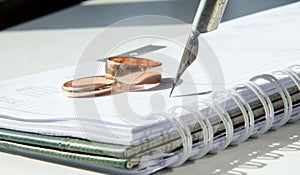 On a white background two wedding rings.