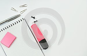 White background with writing materials. Top view with a copy of the text input space. Design workplace on a table, view