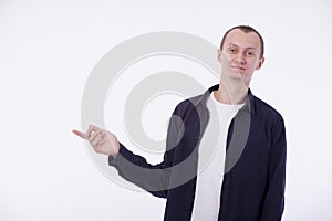 On a white background a young man with a short haircut in a whit