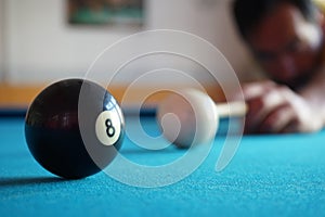 white ball hit on black ball number 8 in a snoker game