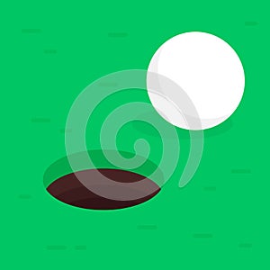 white ball near deep hole on green golf field