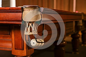 White balls in billiard table pocket indoors, closeup. Space for text