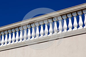 White balustrades with stone railing.